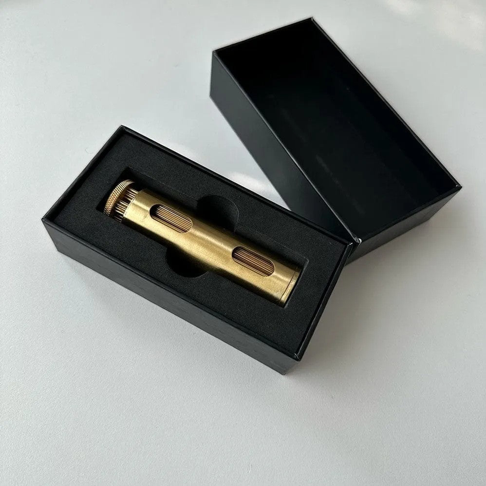 Round brass hand roller with rolling paper